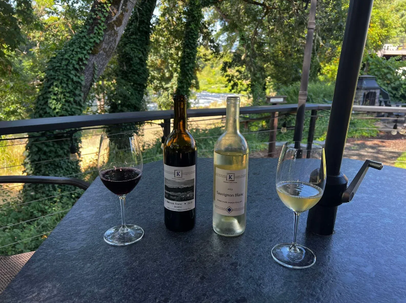 Knostman Wines on patio on North Umpqua River